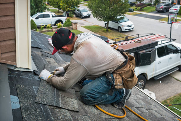 Professional Roofing technician working in Burnsville, MS